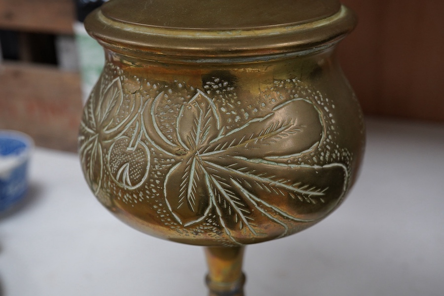 An 20th century continental brass oil lamp with decorative beaded fringed shade, 56cm high. Condition - good